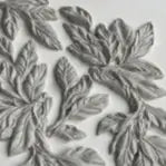 Close-up of IOD Viridis Decor Mould showing intricate leafy designs and botanical elements.