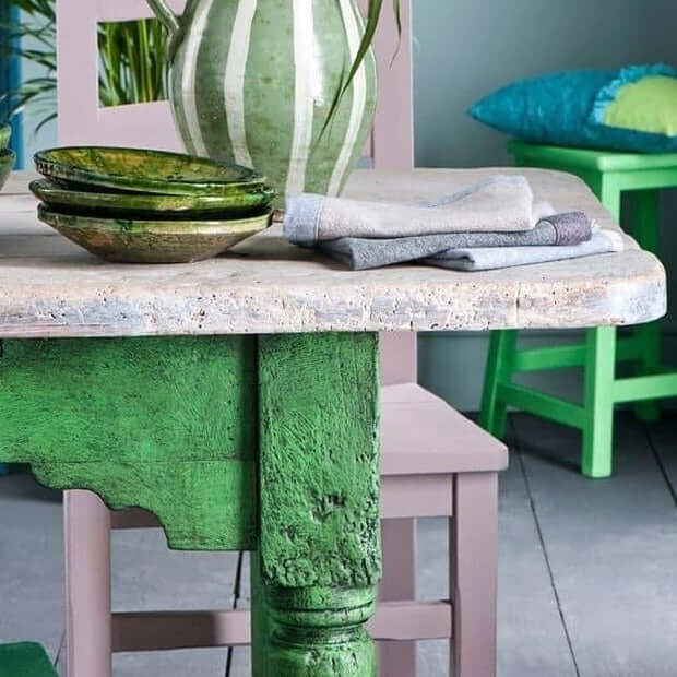 Upcycled rustic farmhouse table painted in Annie Sloan Chalk Paint Antibes Green, styled with ceramic bowls.