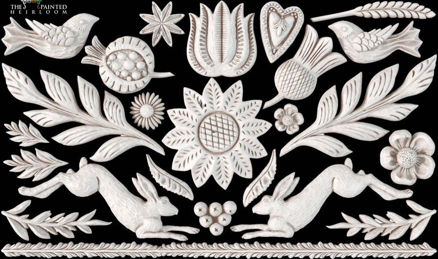 IOD Primitive Decor Mould design featuring floral and animal motifs for creative crafting.