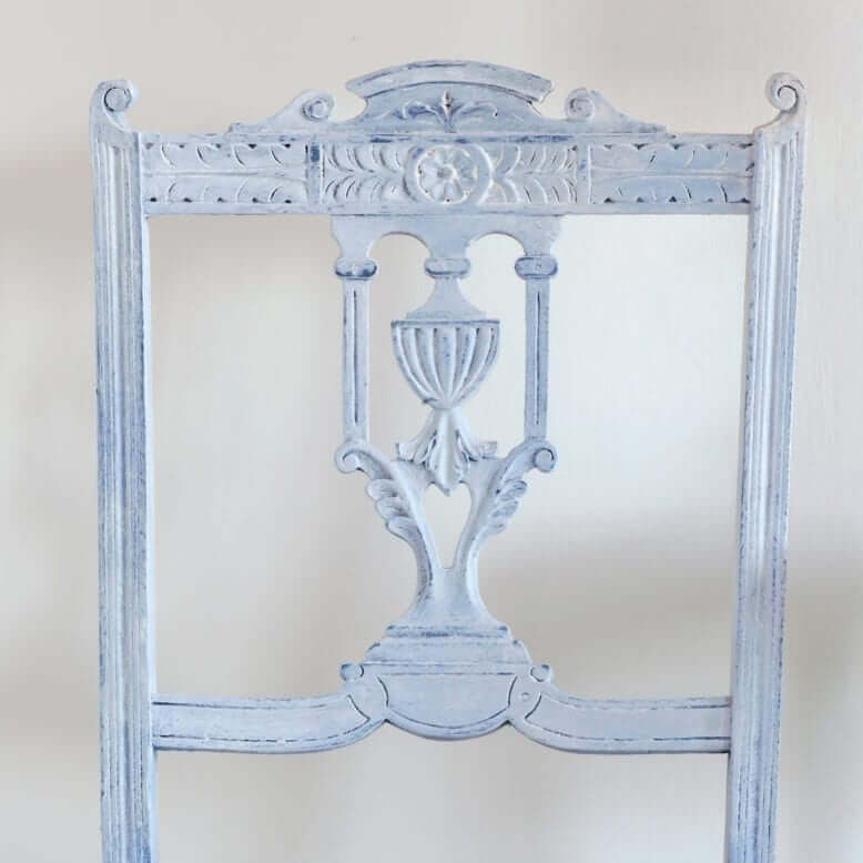 Annie Sloan White Chalk Paint™ Wax used on a vintage chair, showcasing a soft limed finish and elegant detailing.