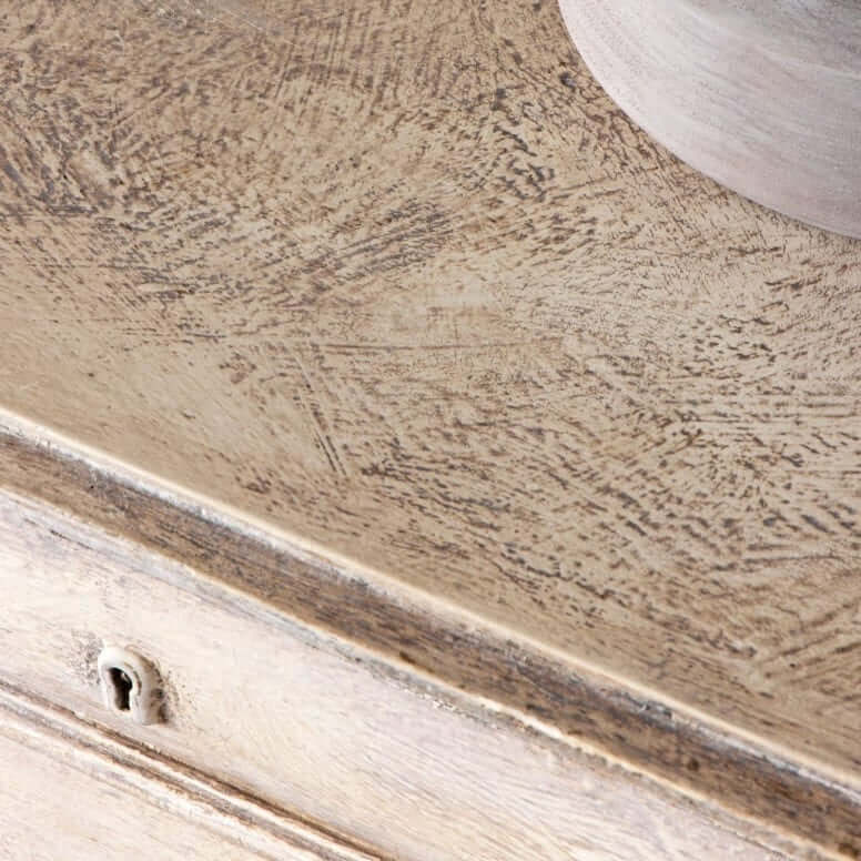 Annie Sloan Dark Chalk Paint™ Wax highlighting texture and color. on furniture