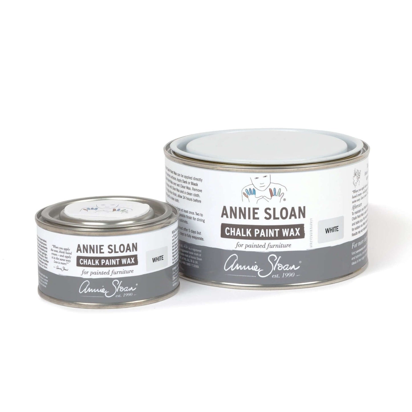 Annie Sloan White Chalk Paint Wax cans in various sizes for furniture finishing and protection.