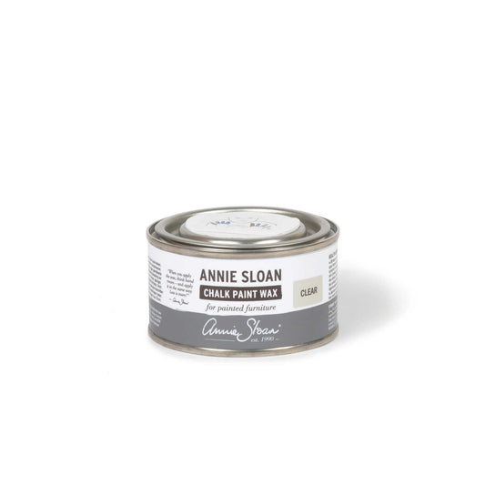 Annie Sloan Clear Chalk Paint™ Wax in a tin, ideal for sealing and protecting painted furniture.