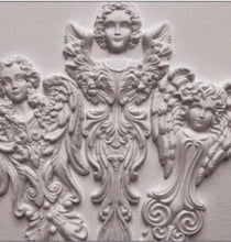 Close-up of the IOD Angelic Tapers Mould featuring intricate angel designs, including beautifully detailed wings and flowing elements, perfect for crafting and decor projects.
