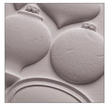 Close-up of the IOD Bibelots Mould showcasing detailed vintage-inspired ornament shapes, including round, teardrop, and oval designs, perfect for creating custom holiday ornaments and decor.