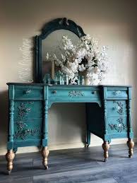 IOD Viridis Decor Mould on a teal painted dresser with flowers and mirror, showcasing botanical elegance.