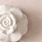 White Ceramic Rose Hook – Decorative wall hook with a detailed white ceramic rose design.