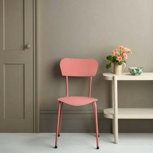French Linen - Annie Sloan Satin Paint used on a pink chair in a stylish interior setting with flowers.