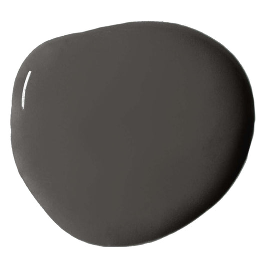 Swatch of Graphite Annie Sloan Wall Paint® in a smooth, rich dark gray color.