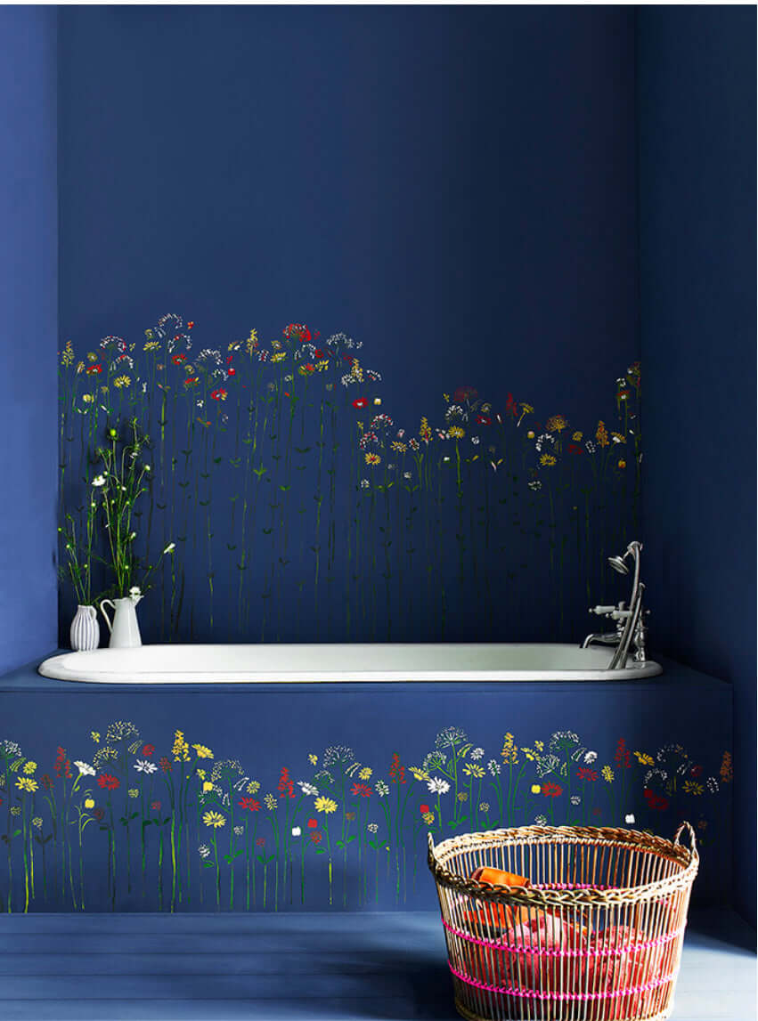 Napoleonic Blue - Annie Sloan Wall Paint in a bathroom setting with floral decoration.