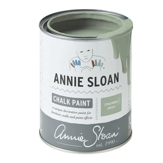 Coolabah Green Annie Sloan Chalk Paint® can with paint oozing from the top, showcasing its versatile muted blue-green color.