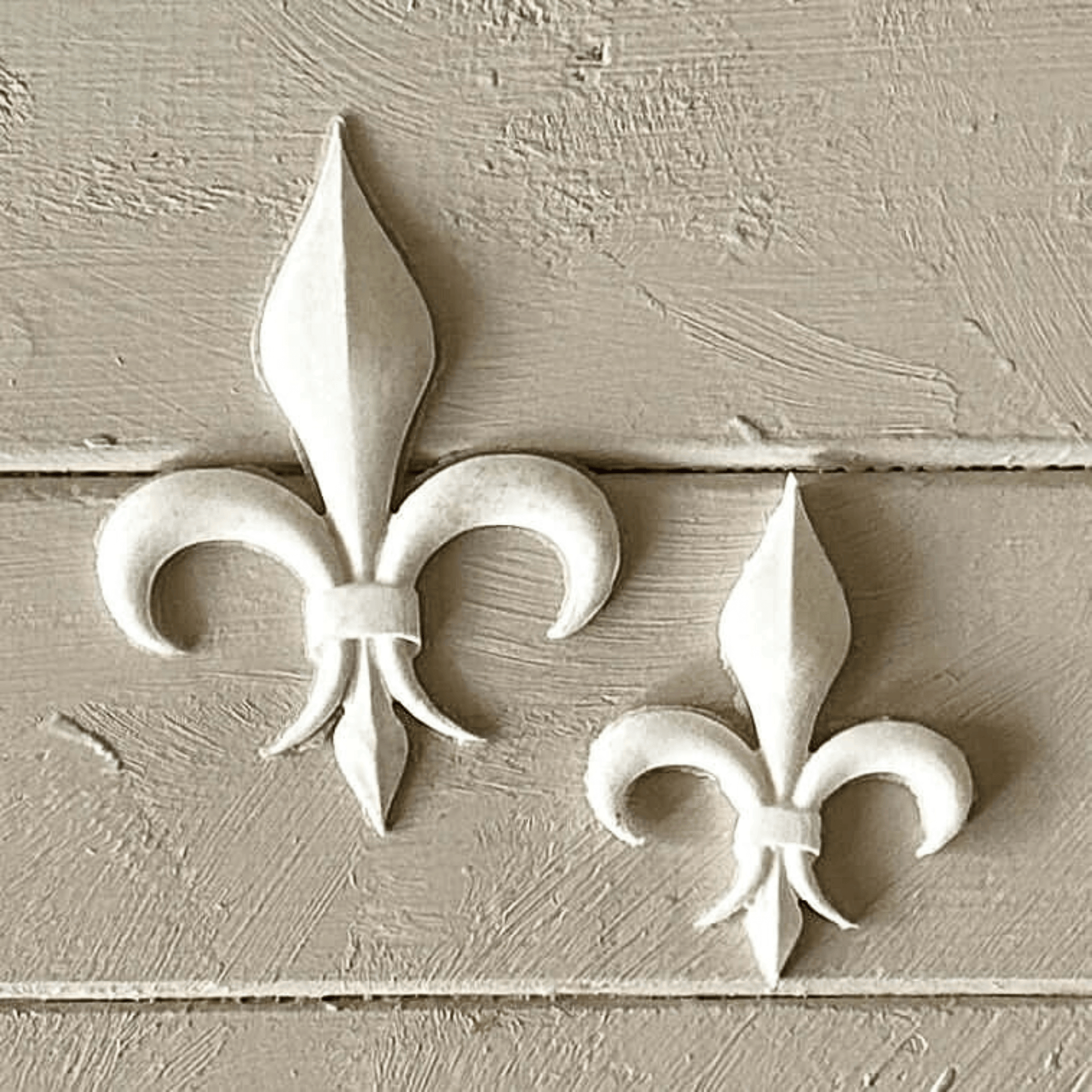 Fleur De Lis 003 - Resin Applique for Furniture & Crafts in white, showing two decorative pieces for home projects.