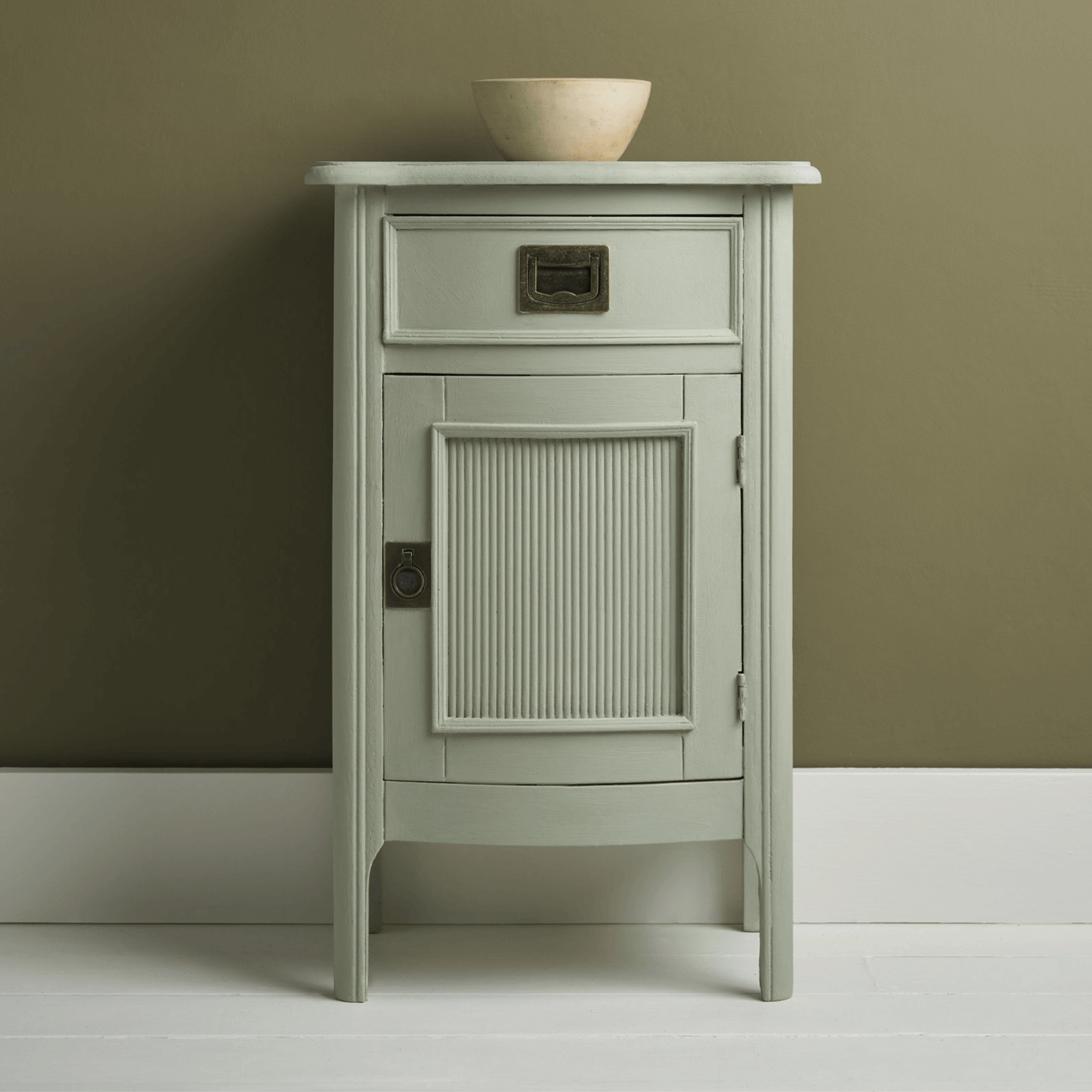 Coolabah Green Annie Sloan Chalk Paint used on a stylish cabinet with a minimalist design.