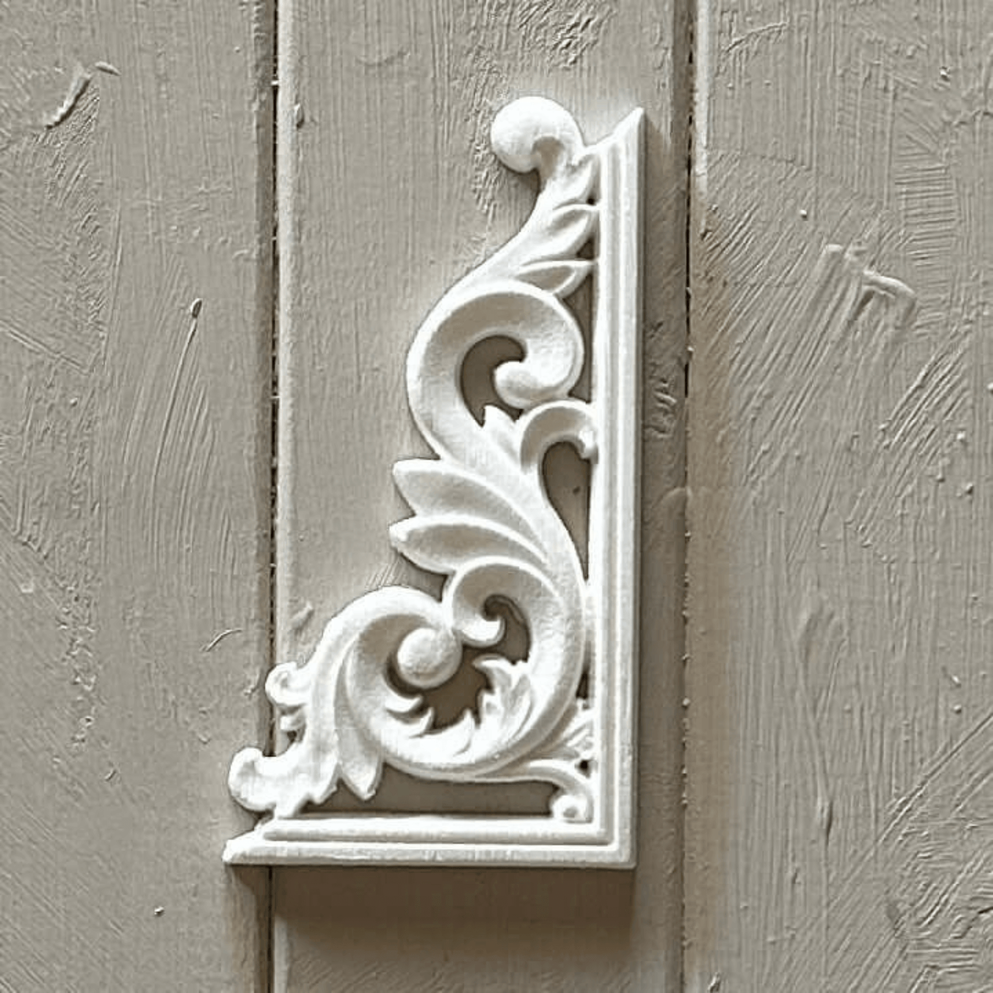 Corner furniture appliqué with raised scroll pattern, designed for enhancing upcycled dressers, cabinets, and decorative wall panels.