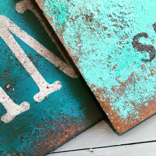 Rust & Aged Techniques Workshop - close-up of vintage patina with rusty texture on teal background.