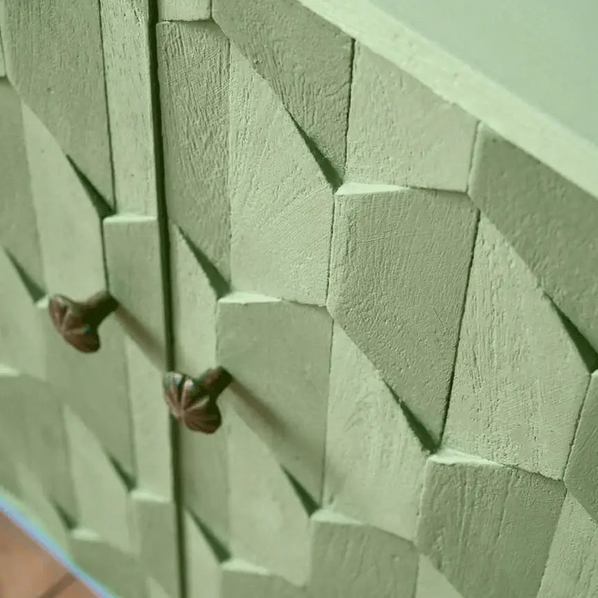 Painted furniture in Capability Green using Annie Sloan Chalk Paint®, showcasing a textured finish and elegant details.
