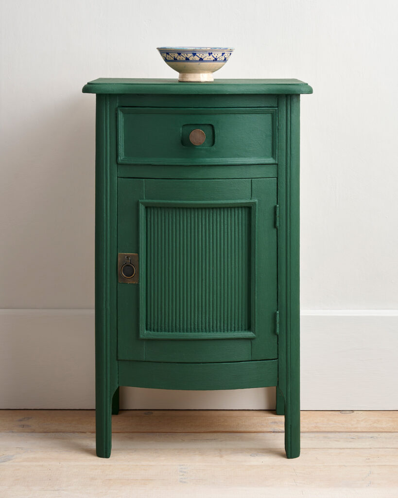 Amsterdam Green - Annie Sloan Chalk Paint used on a stylish green bedside table with decorative bowl.