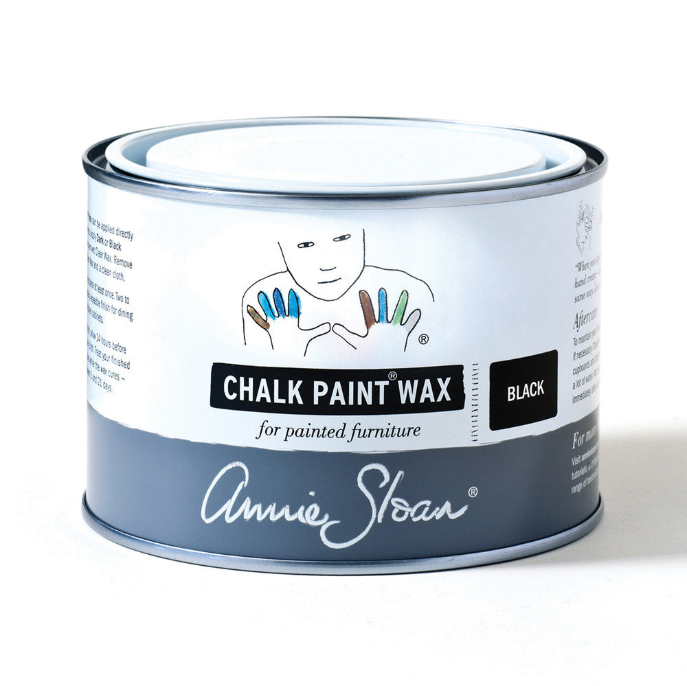 A 500ml tin of Annie Sloan Black Chalk Paint™ Wax, ideal for adding depth, enhancing texture, and protecting painted furniture. The tin features the Annie Sloan logo and a modern design.
