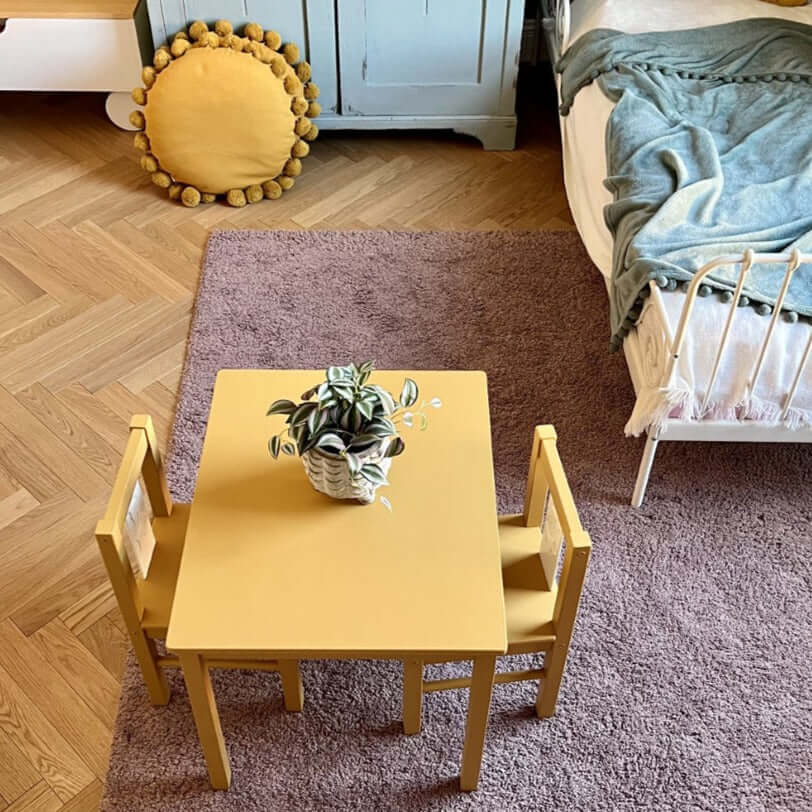 Carnaby Yellow - Annie Sloan Satin Paint used on a children's table and chairs in a stylish room.