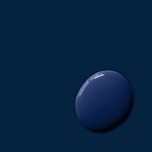 Oxford Navy - Annie Sloan Satin Paint shown as a paint droplet on a dark background.