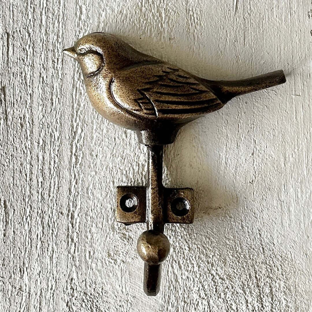 Bronze Bird Wall Hook - Vintage style decorative bird hook with detailed wings and warm metallic finish.