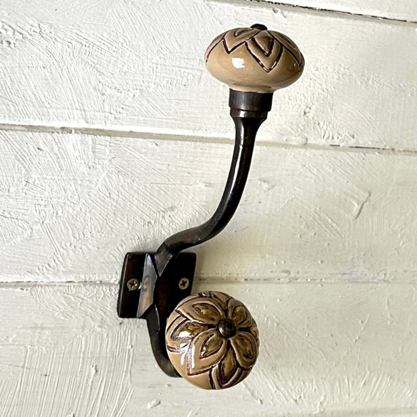 Ceramic Double Hook in Coffee & Gold with floral and geometric designs on beige knobs