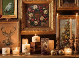 Elegant Christmas décor display featuring framed vintage Christmas art with wreaths, reindeer, and Christmas trees, along with candles and ornaments, using IOD Crimson Velvet Transfers.