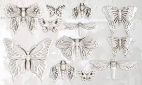 IOD Monarch Decor Mould showing detailed butterflies and dragonflies for crafts and baking.