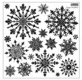 Close-up of the IOD Vintage Snowflakes Stamp, showing a collection of detailed vintage-style snowflake designs in black, arranged across a 12" x 12" sheet.