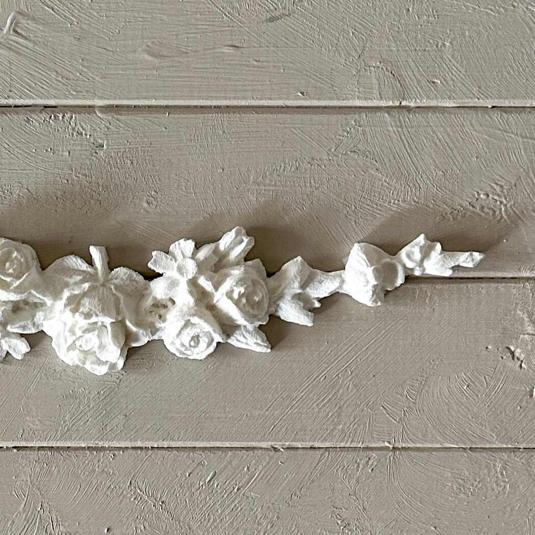 Swag 004 - Resin Applique for Furniture & Crafts floral design with roses and foliage on a light wooden background.