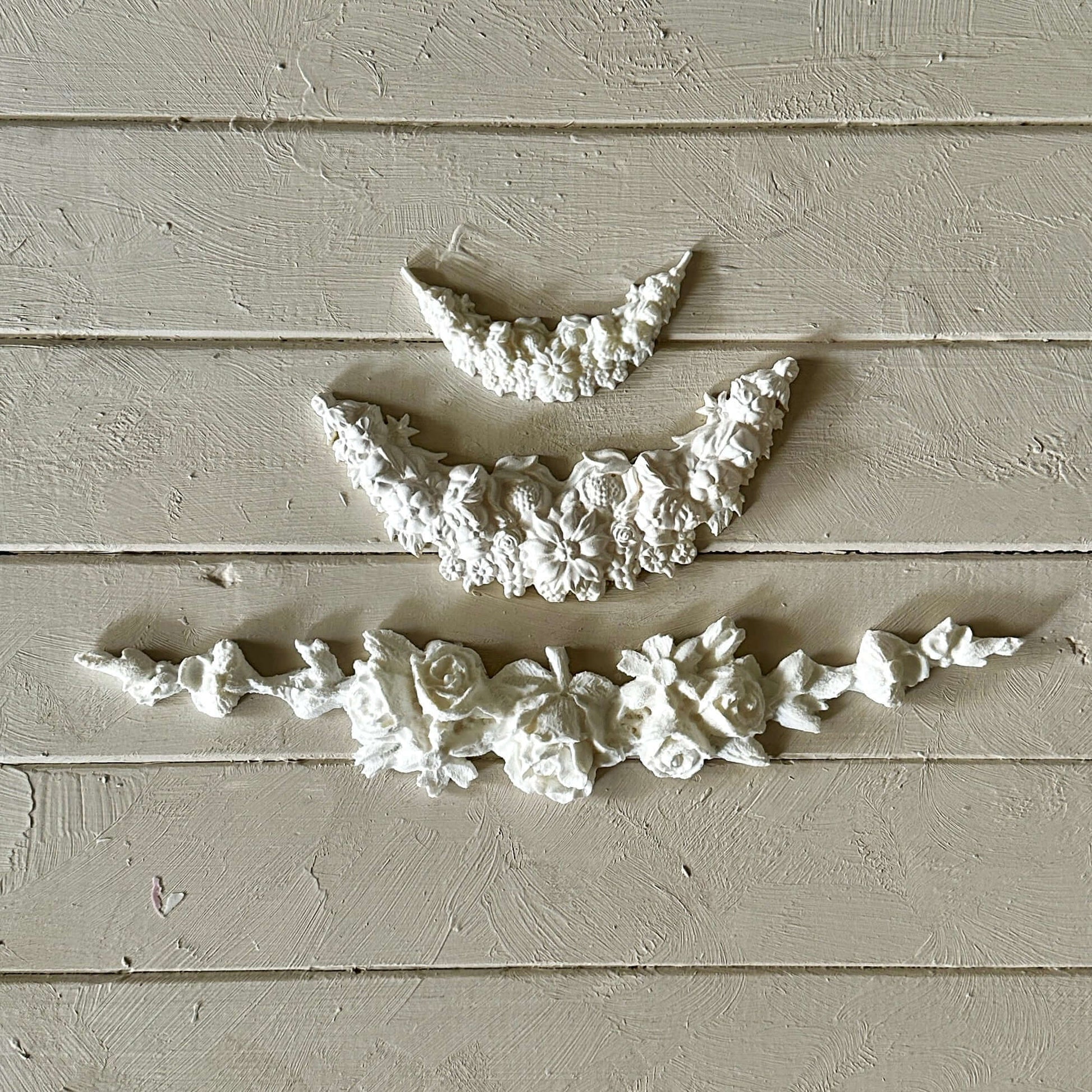 Swag 003 - Resin Applique for Furniture & Crafts displayed on wooden surface.