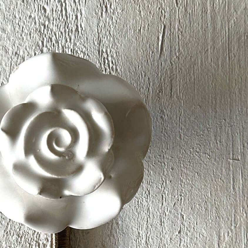 White Ceramic Rose Hook – close-up of a decorative white ceramic rose design