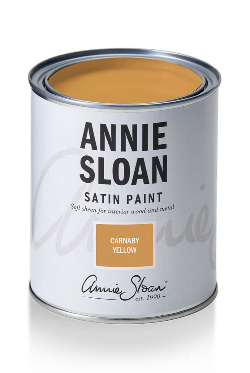 Carnaby Yellow - Annie Sloan Satin Paint can showcasing its rich mustard yellow color and branding.