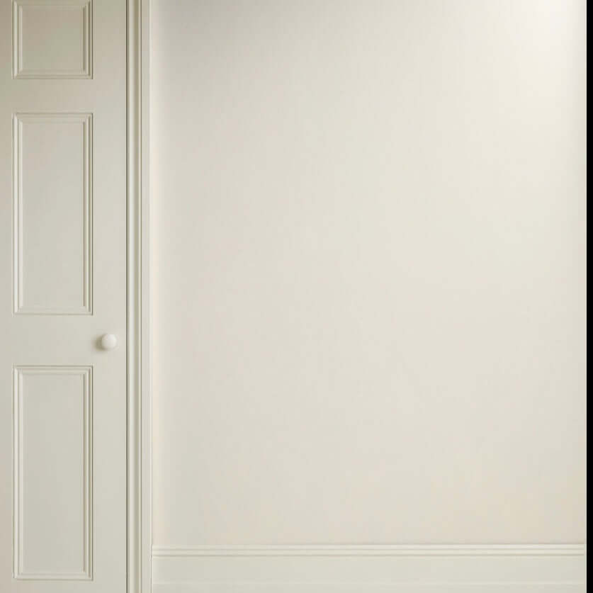 Old White - Annie Sloan Satin Paint used on a wall and door, showcasing a soft and versatile white shade.