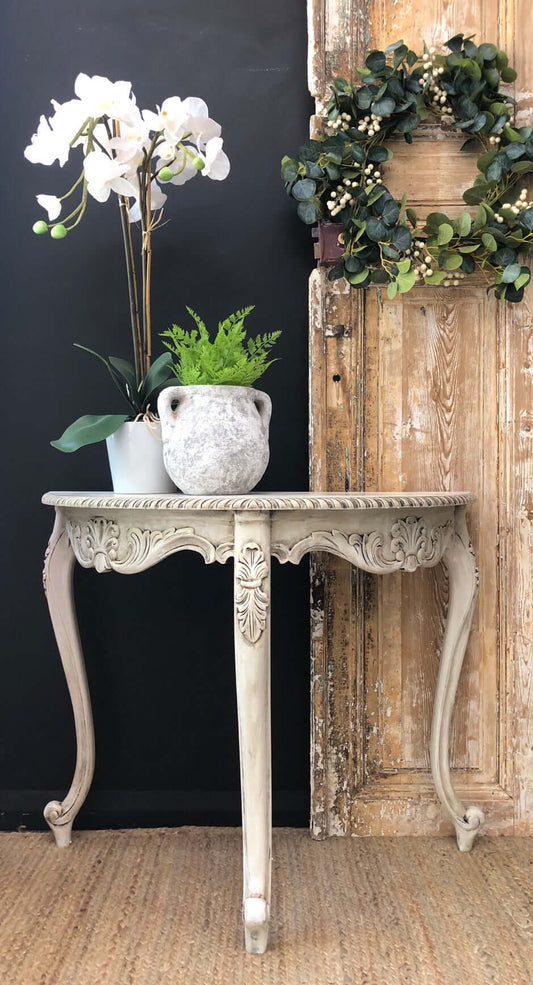 Ornate half moon table